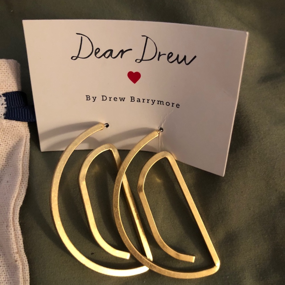 Pierced earrings by drew Barrymore